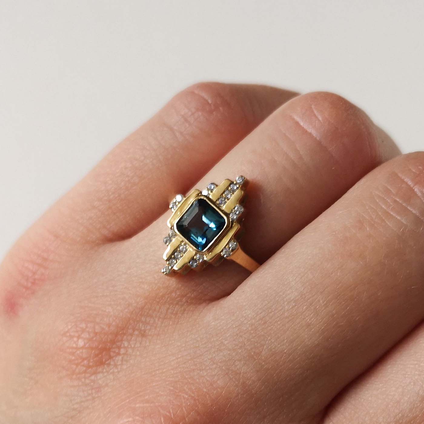 Levels of Light Engagement Ring with Blue Topaz